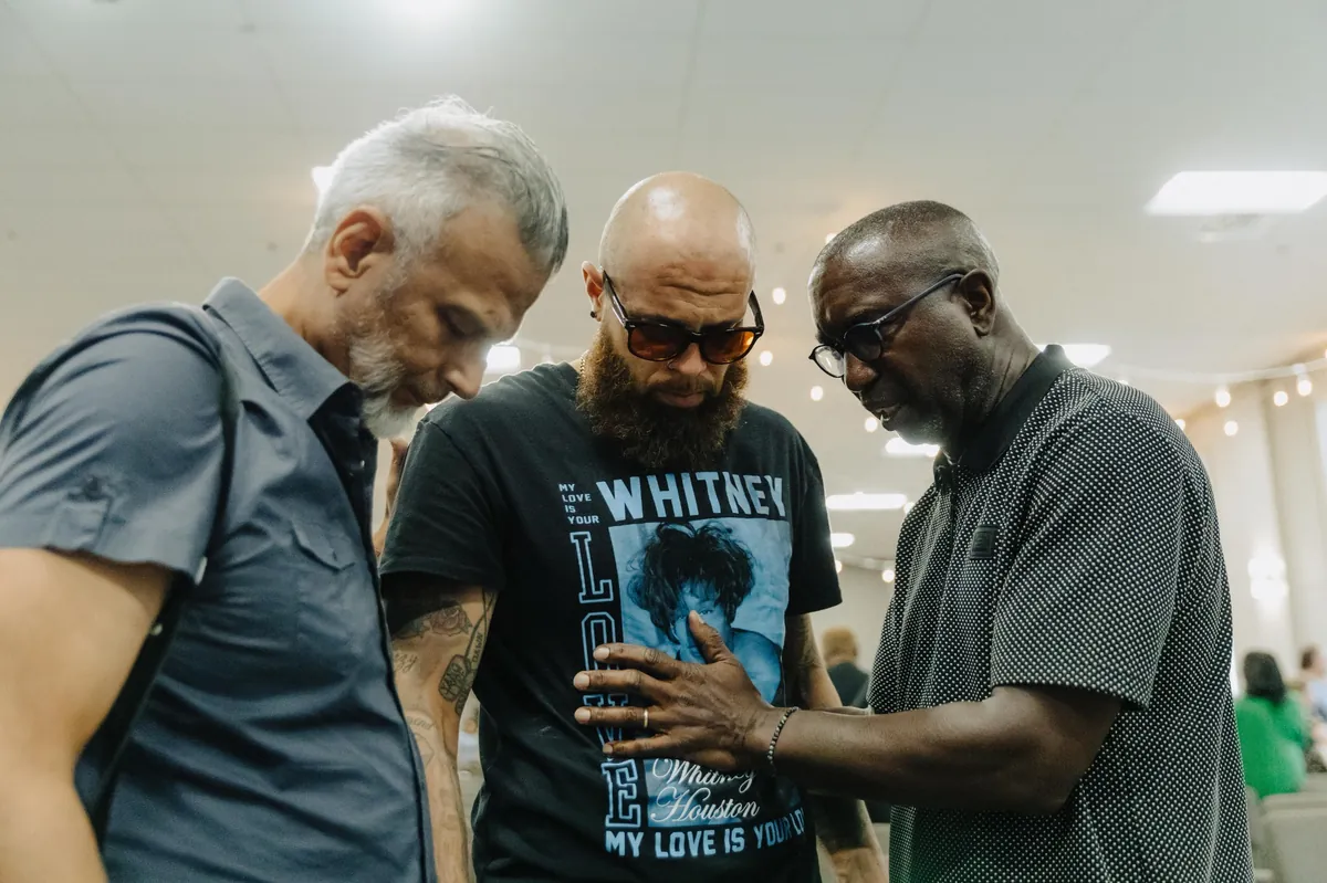 Praying with our Community new Spirit of God Fellowship Church in South Holland, IL